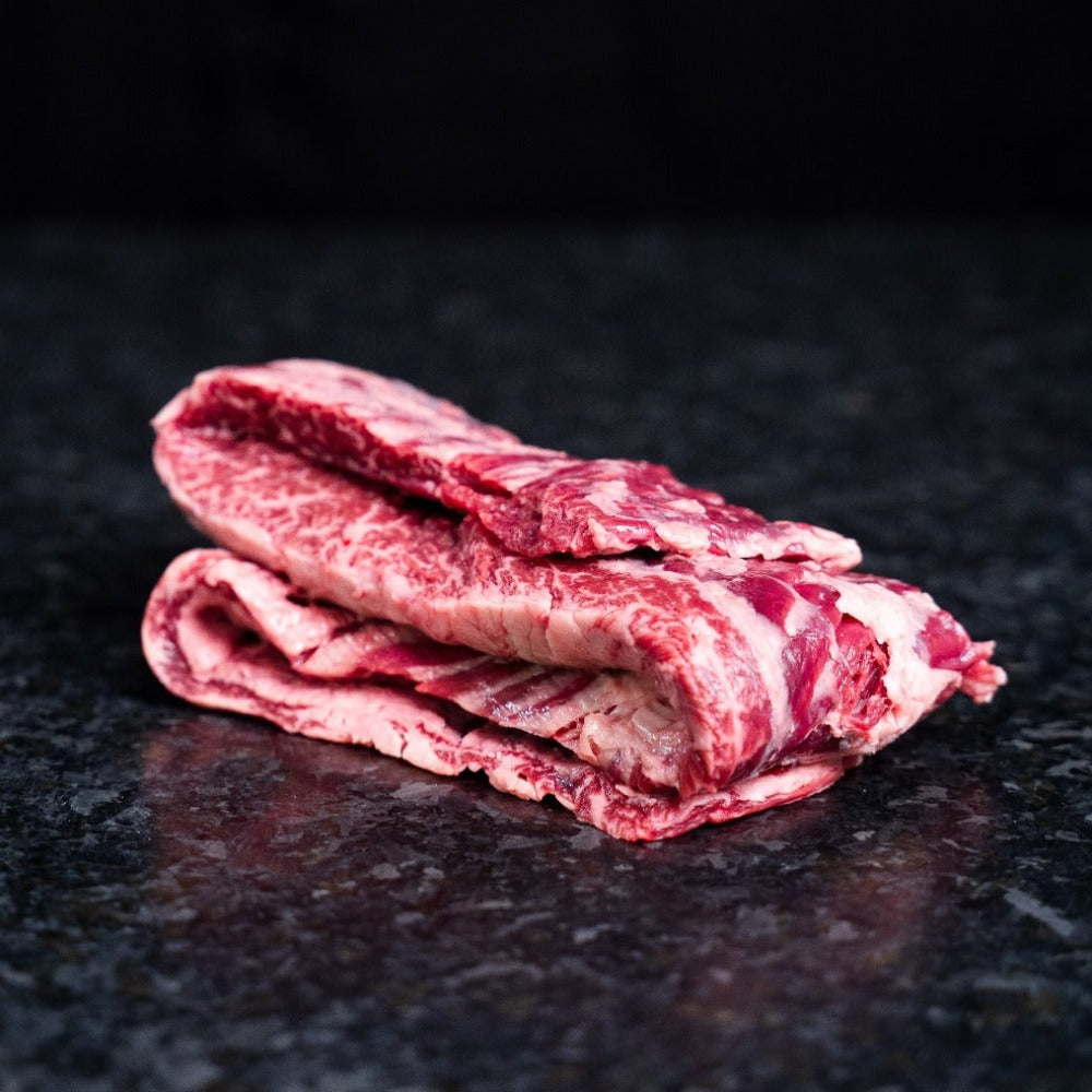 American Wagyu skirt steak with deep marbling and bold flavor, ideal for grilling, tacos, or stir-fry