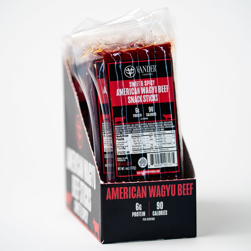 Packaged American Wagyu beef snack sticks with branding on a white background