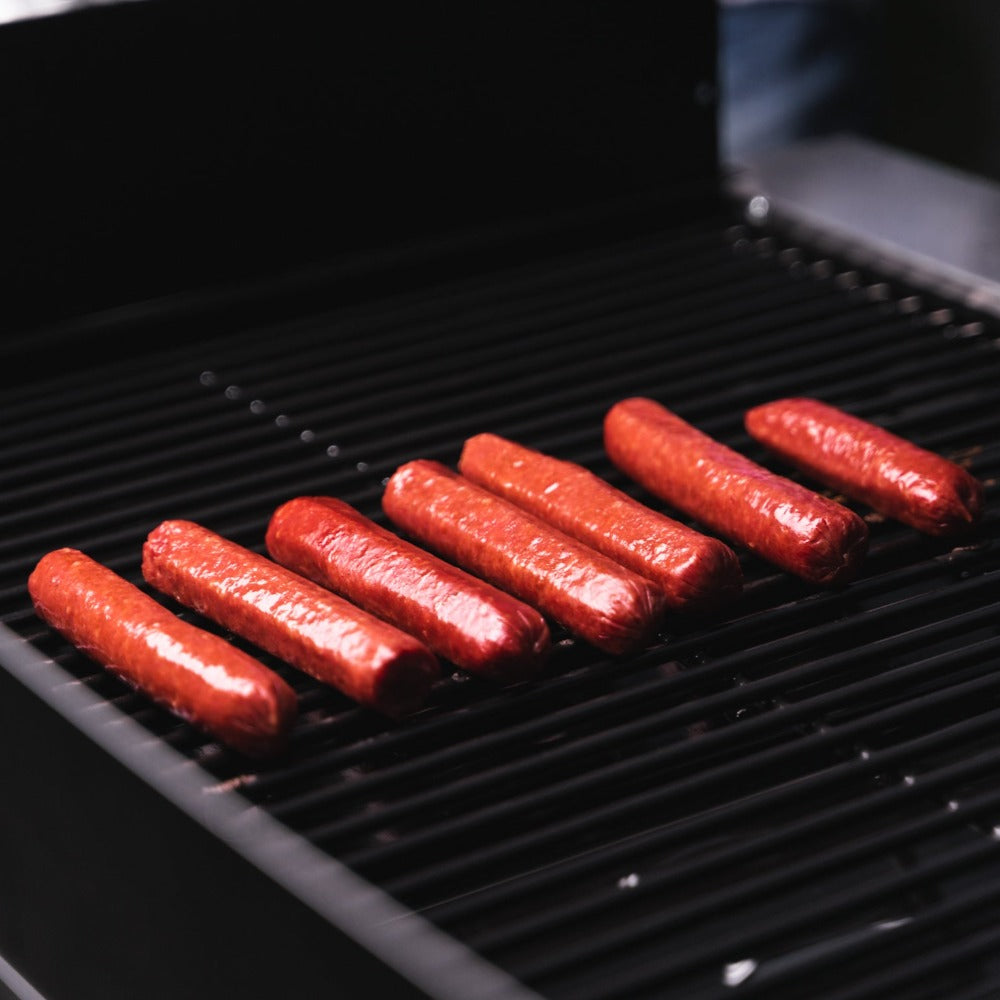 American Wagyu hot dogs with rich, juicy flavor and a natural snap - perfect for grilling, tailgates, or family meals