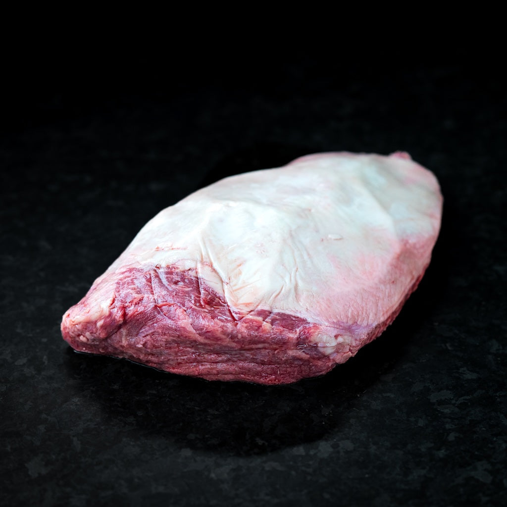 American Wagyu picanha steak with signature fat cap and rich marbling, perfect for grilling or roasting