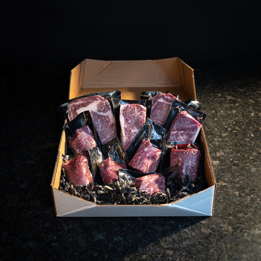 Ultimate Steak Box featuring a premium assortment of American Wagyu steaks, including ribeye, filet, and NY strip